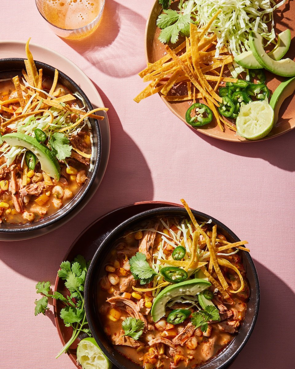 chipotle chicken pozole in bowls from the Ambitious Kitchen Cookbook