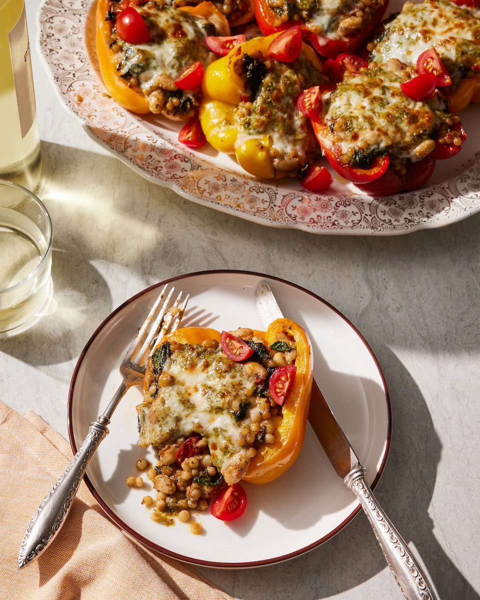 stuffed peppers in a pan and on a plate