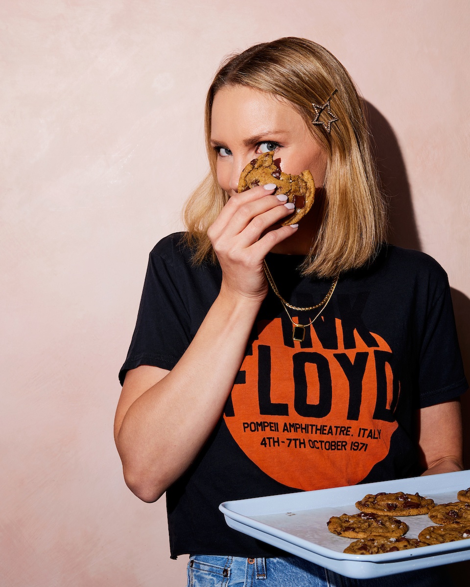 monique of ambitious kitchen holding a cookie