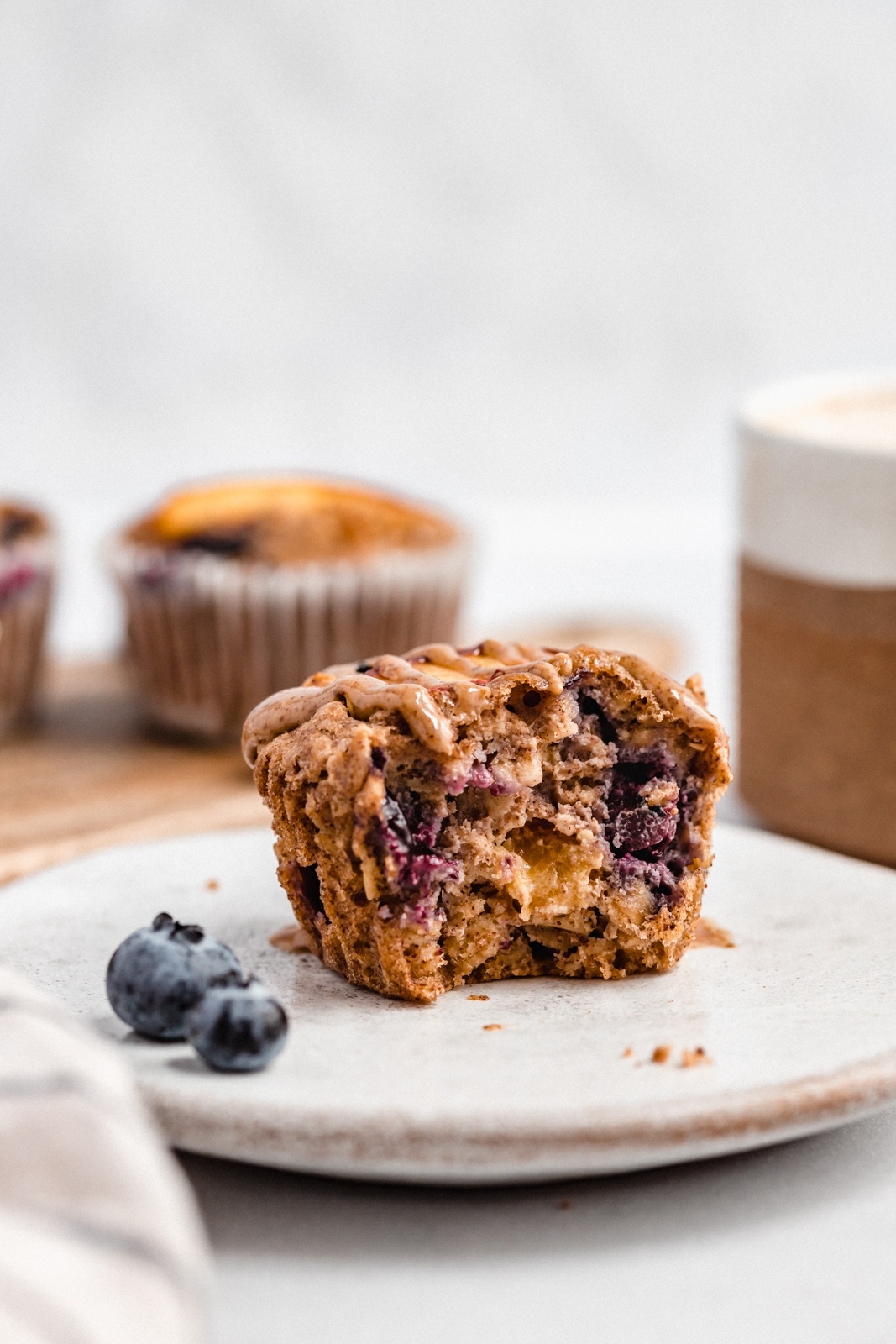 gluten free blueberry peach baked oatmeal cup on a plate