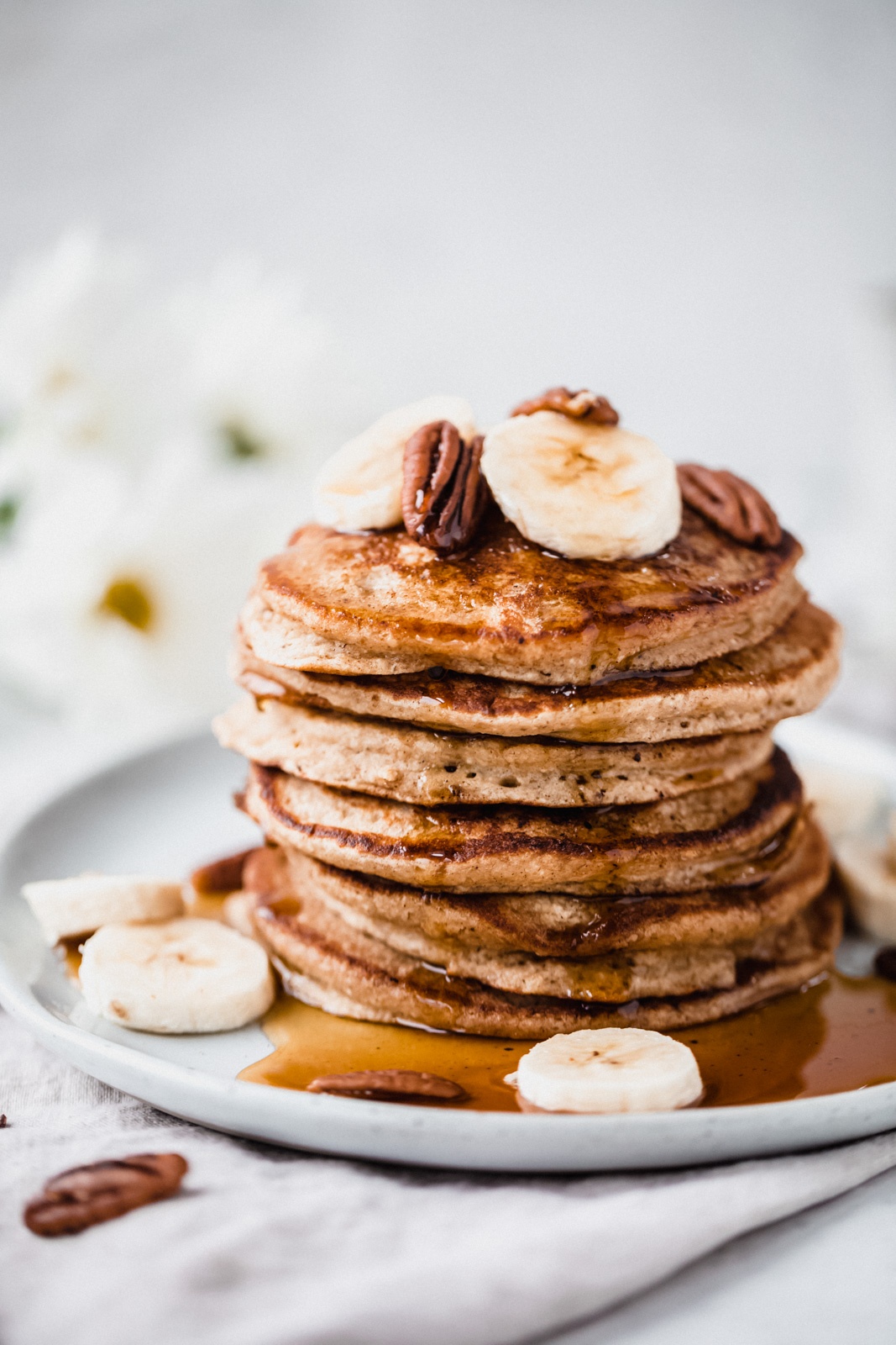 stack of banana pancakes on a plate