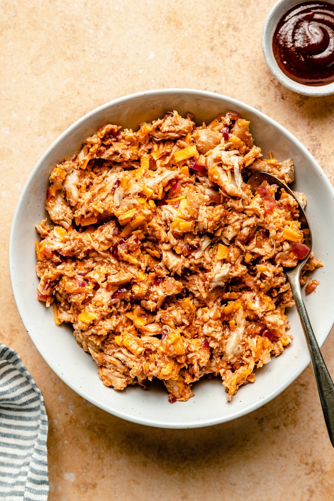 bbq chicken and cheese mixture in a bowl to make bbq chicken zucchini boats