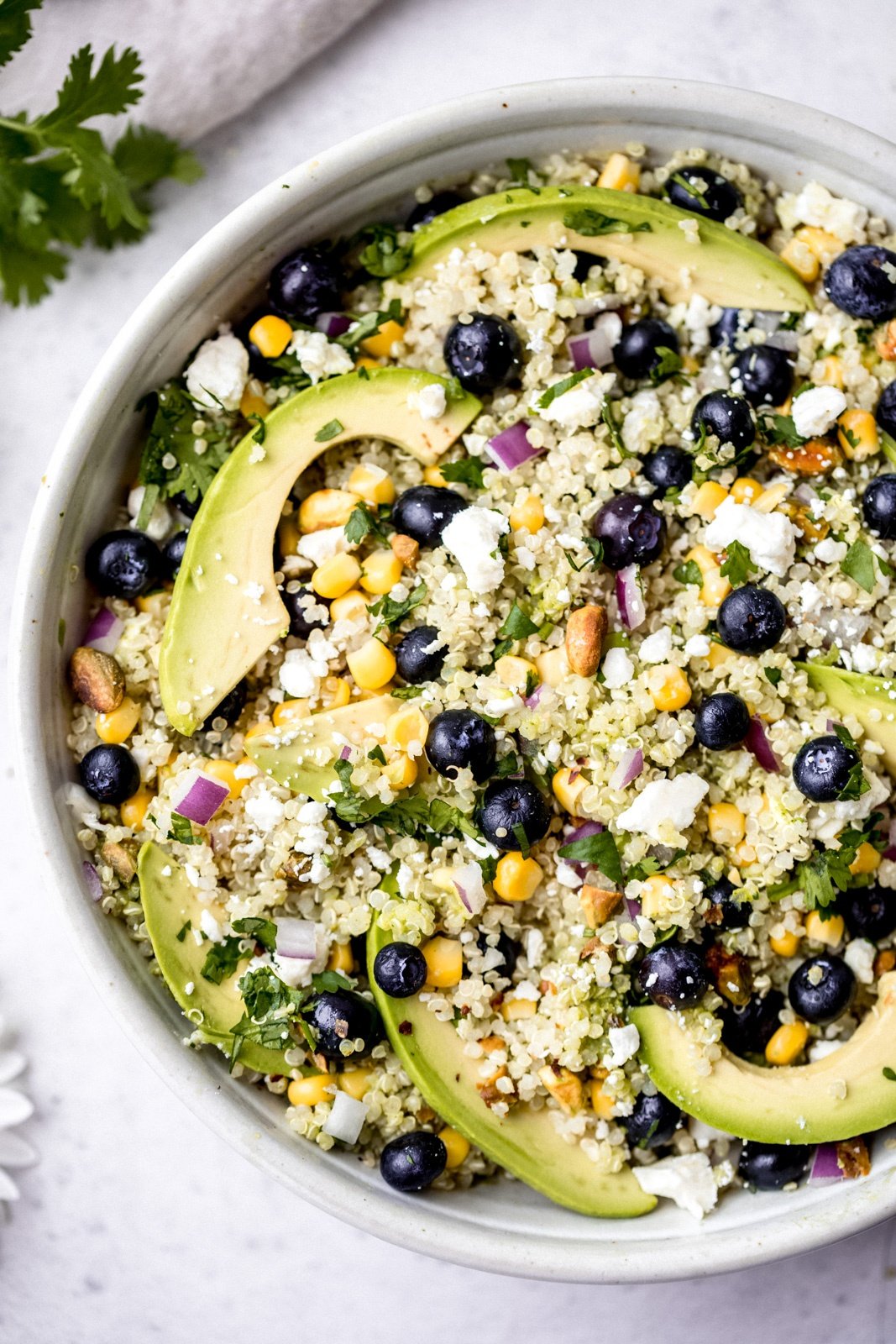 avocado blueberry quinoa salad in a bowl