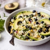 blueberry quinoa salad in a bowl with a spoon