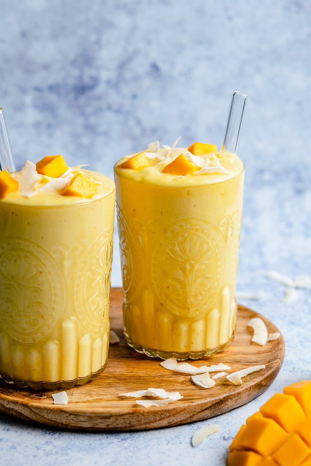 two tropical turmeric smoothies in glasses