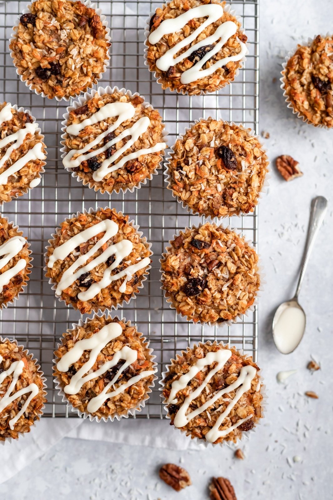 carrot cake baked oatmeal cups on a wire rack