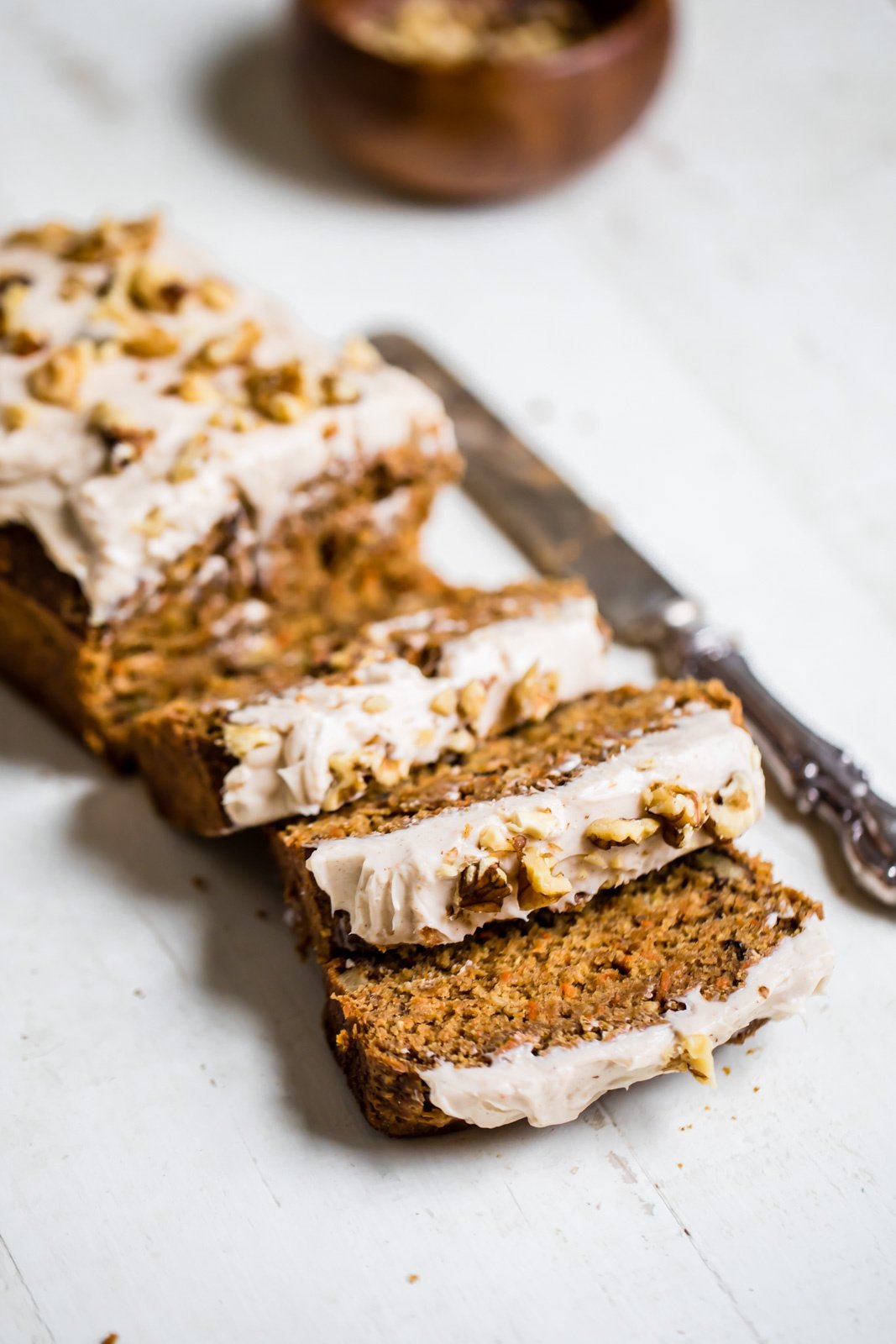 healthier carrot cake banana bread with cream cheese frosting sliced