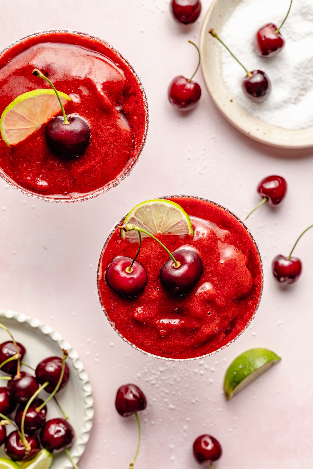 top-down view of two frozen cherry margaritas