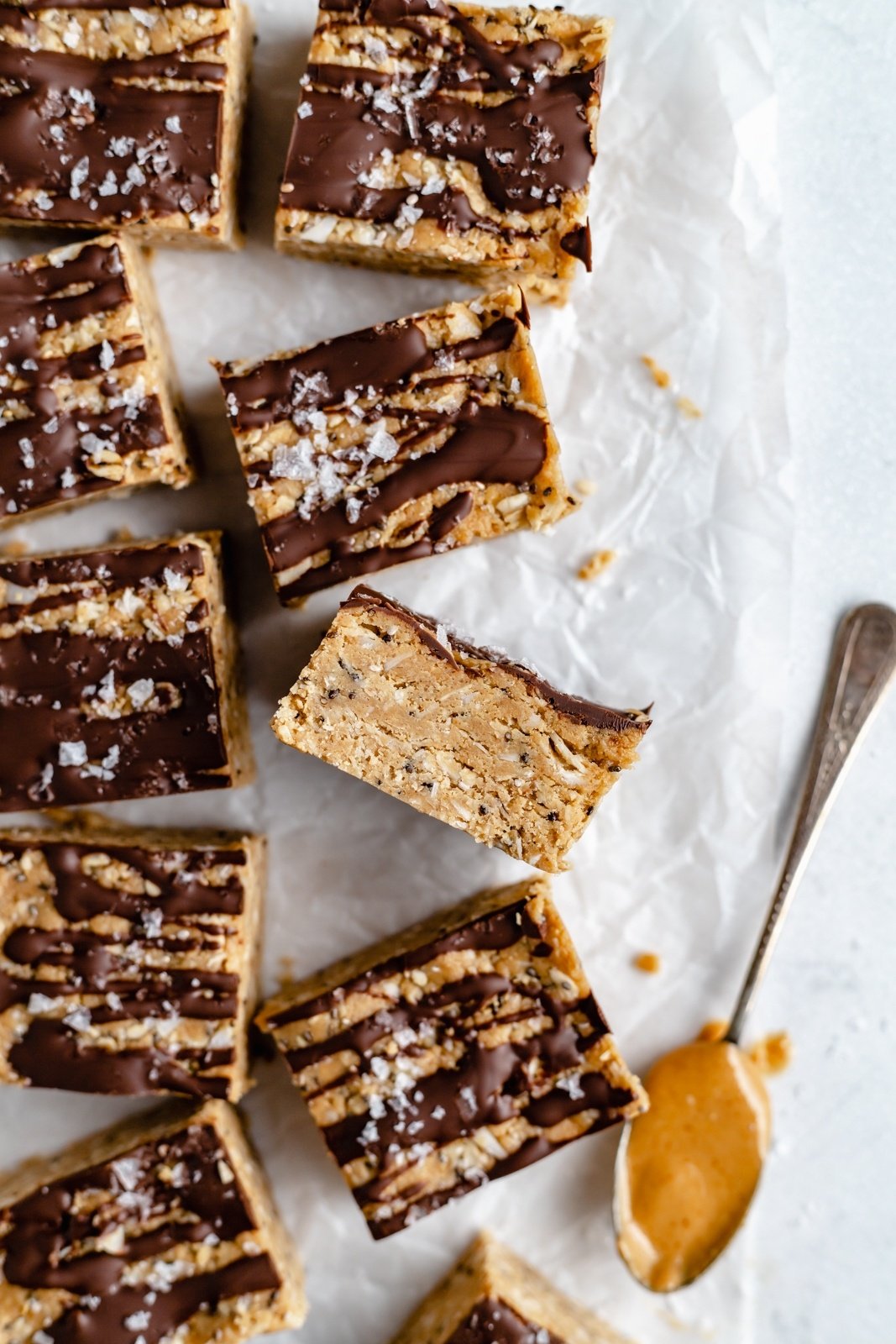 homemade coconut chocolate protein bars on parchment paper