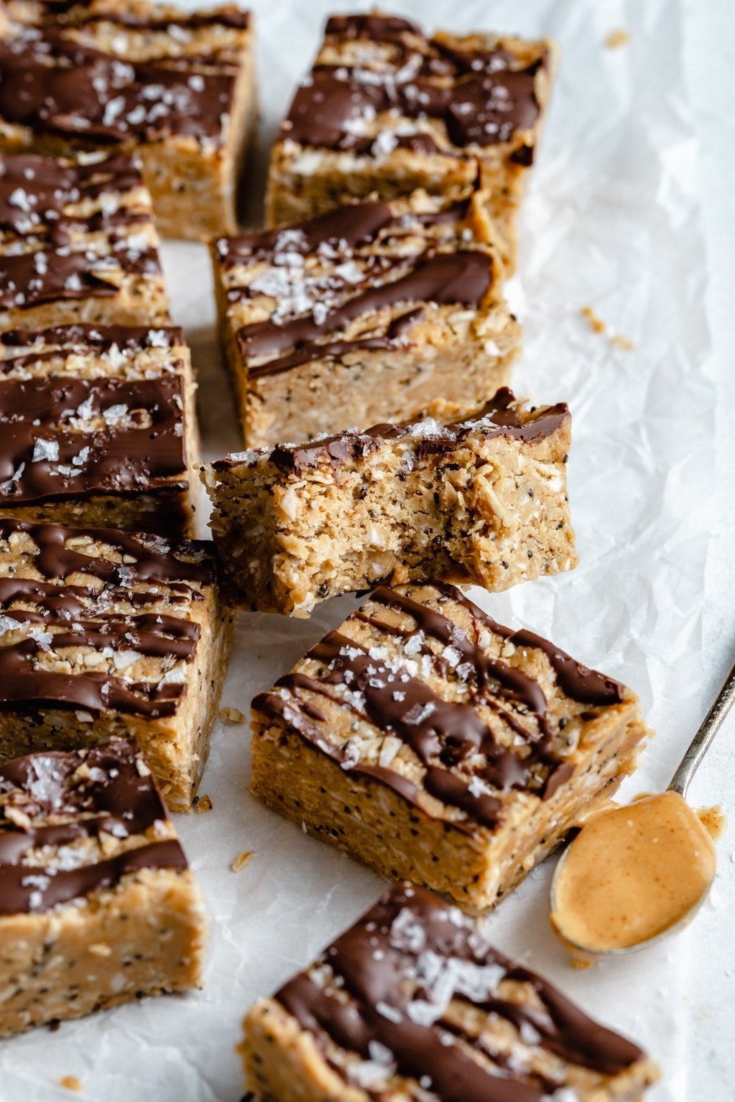 homemade coconut chocolate protein bars on parchment paper