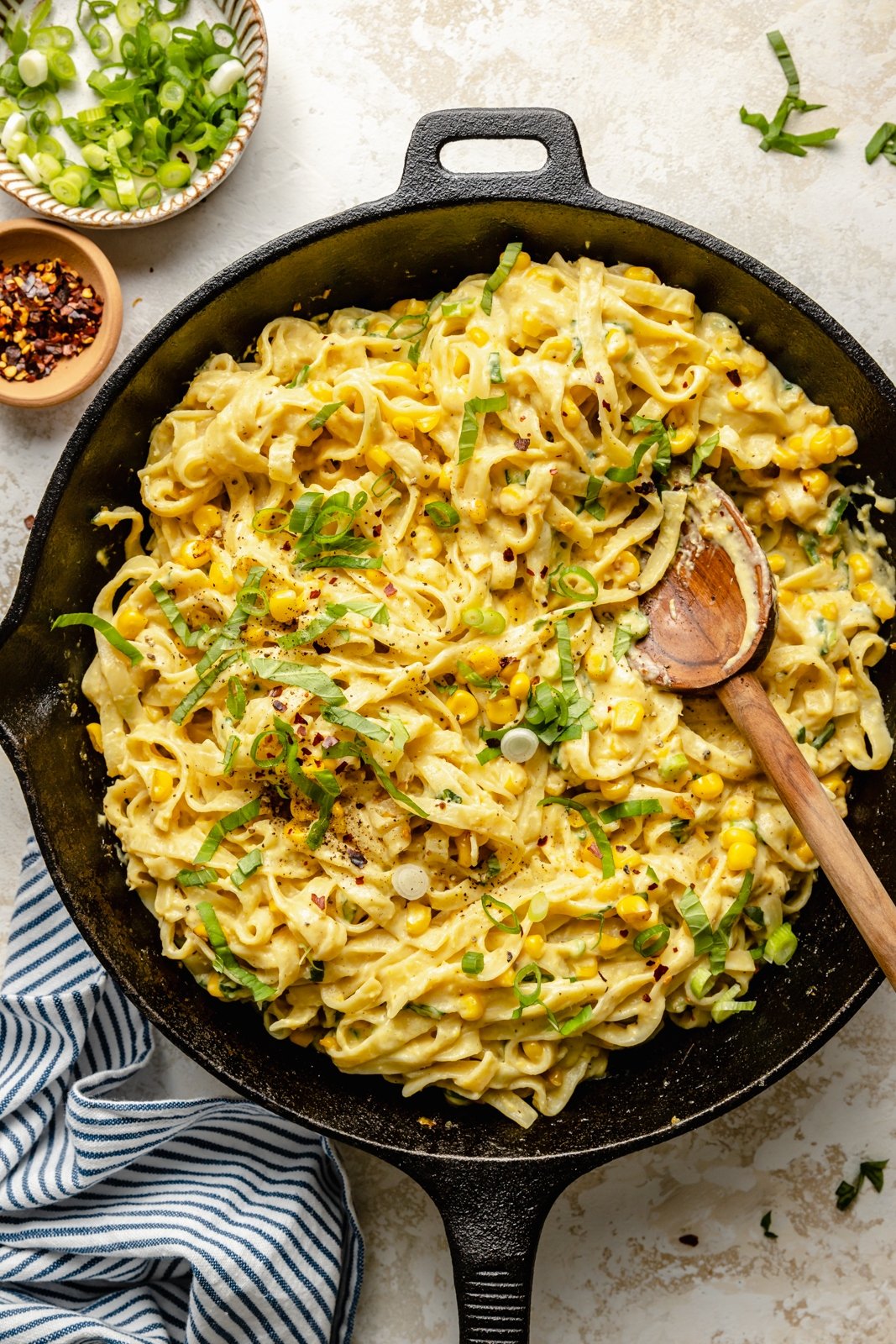 brown butter corn and ricotta pasta in a skillet