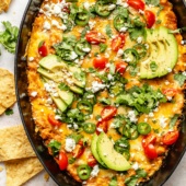 southwest bean dip in a skillet next to tortilla chips