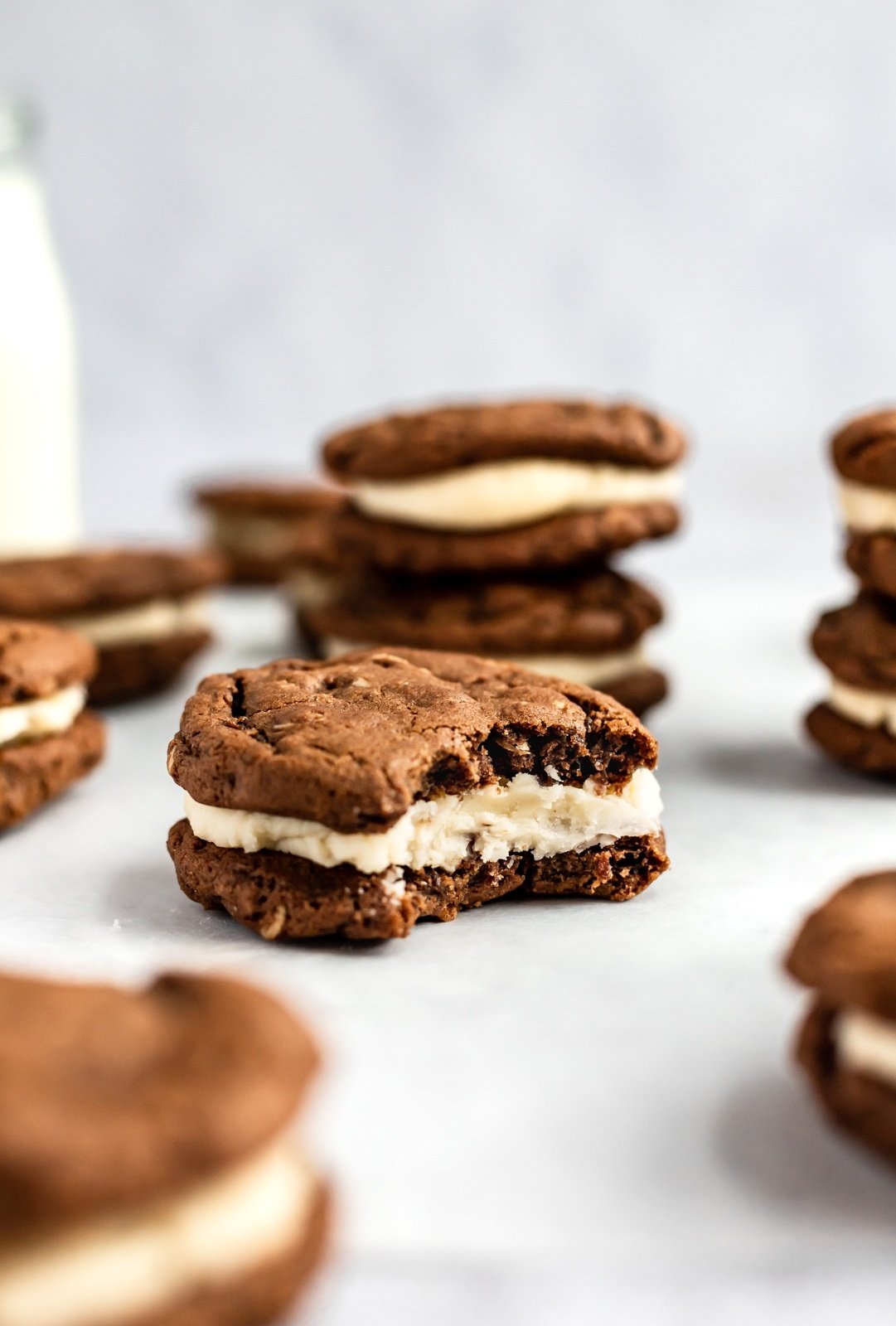 gingerbread sandwich cookie with a bite taken out