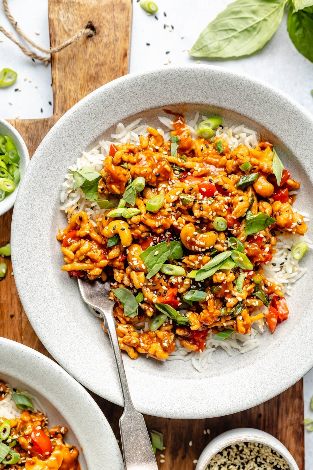 gochujang chicken bowls with basil and cashews