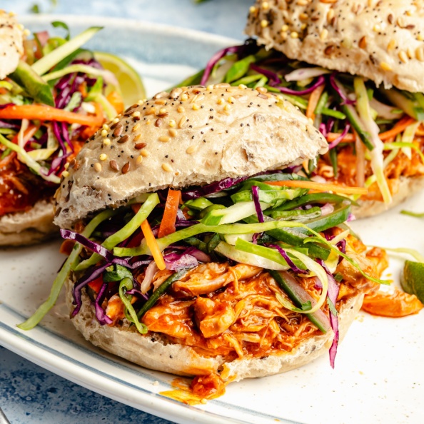 gochujang pulled chicken sandwiches on a platter