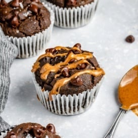 gluten free chocolate spinach muffin drizzled with peanut butter