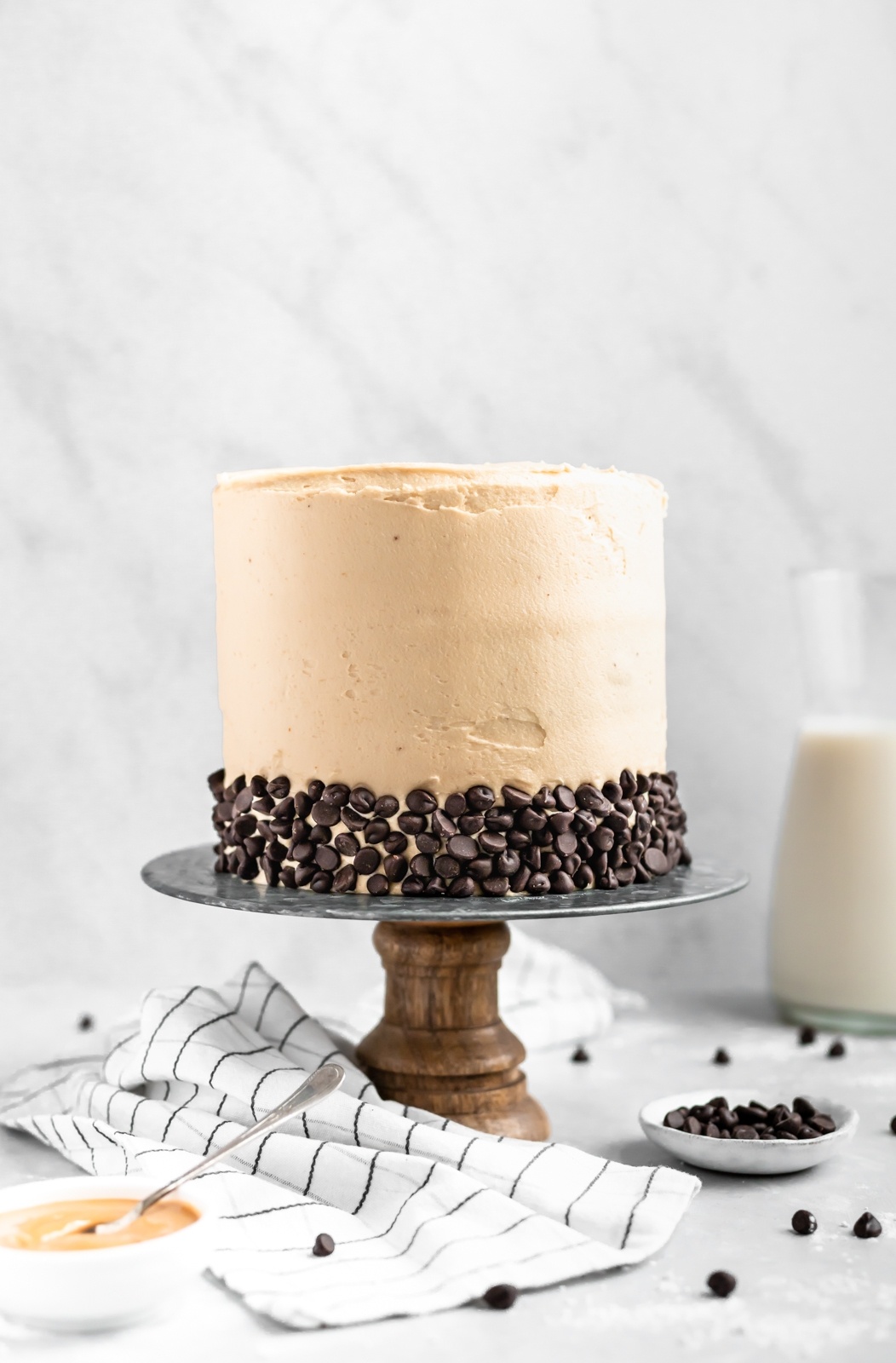 grain free peanut butter banana cake on a cake stand