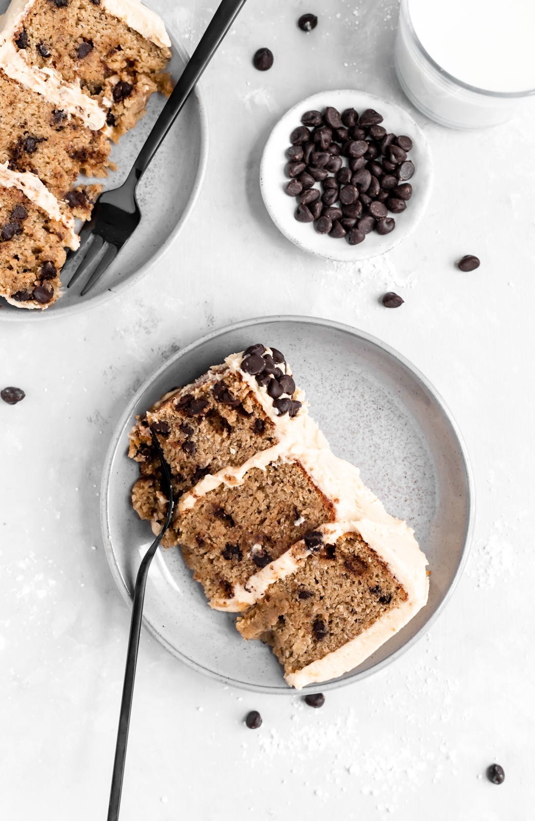 two slices of gluten free peanut butter banana cake on two plates