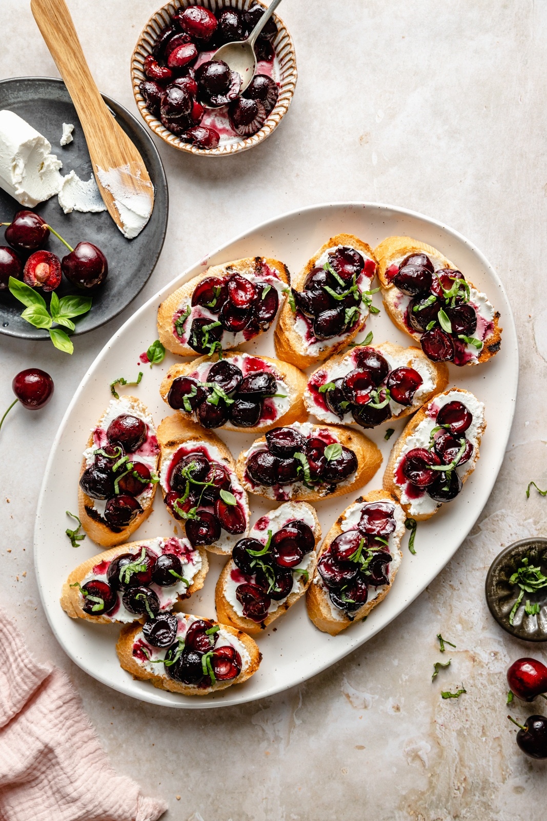 roasted cherry and ricotta grilled crostini on a serving tray