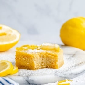 healthy lemon bar with a bite taken out