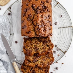 healthy zucchini bread sliced on a wire rack