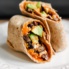 healthy breakfast burrito with avocado, sweet potato and black beans