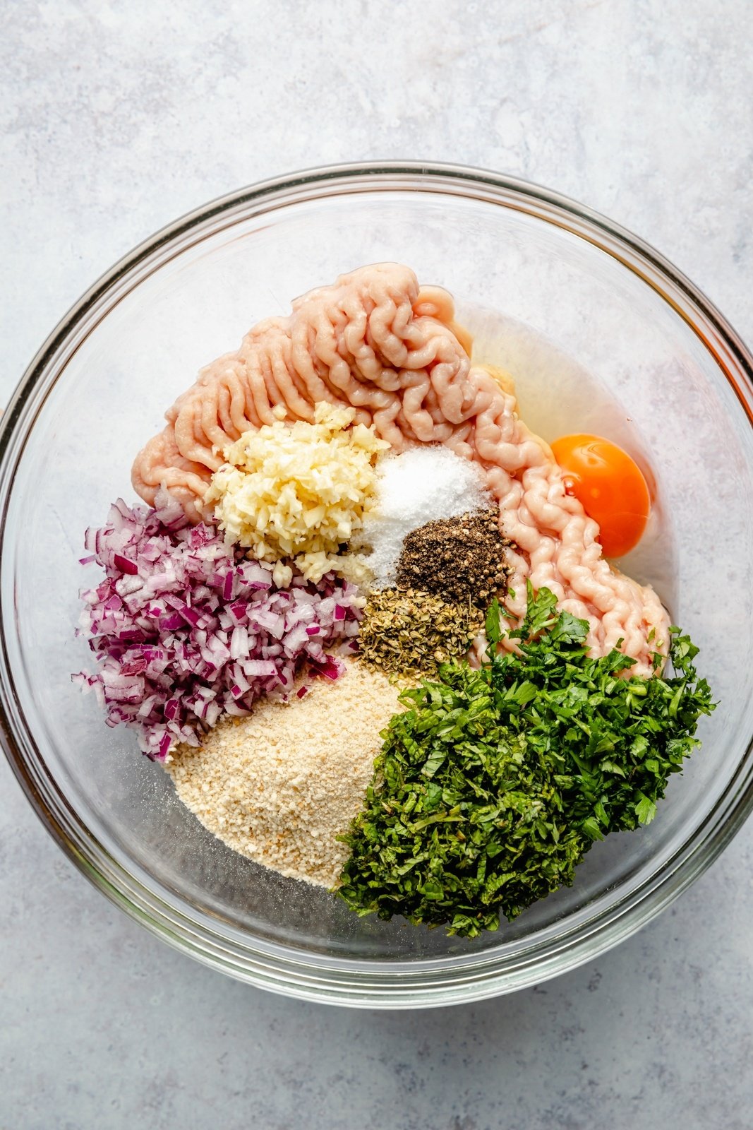 ingredients for Greek turkey meatballs in a bowl