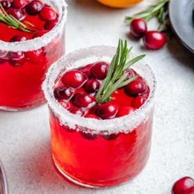 holiday punch in a glass with cranberries