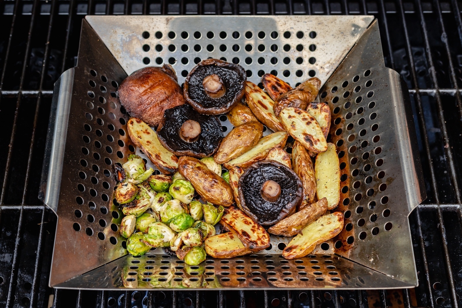 grilling vegetables in a grill basket