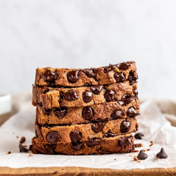 almond flour banana bread sliced and stacked on top of eachother