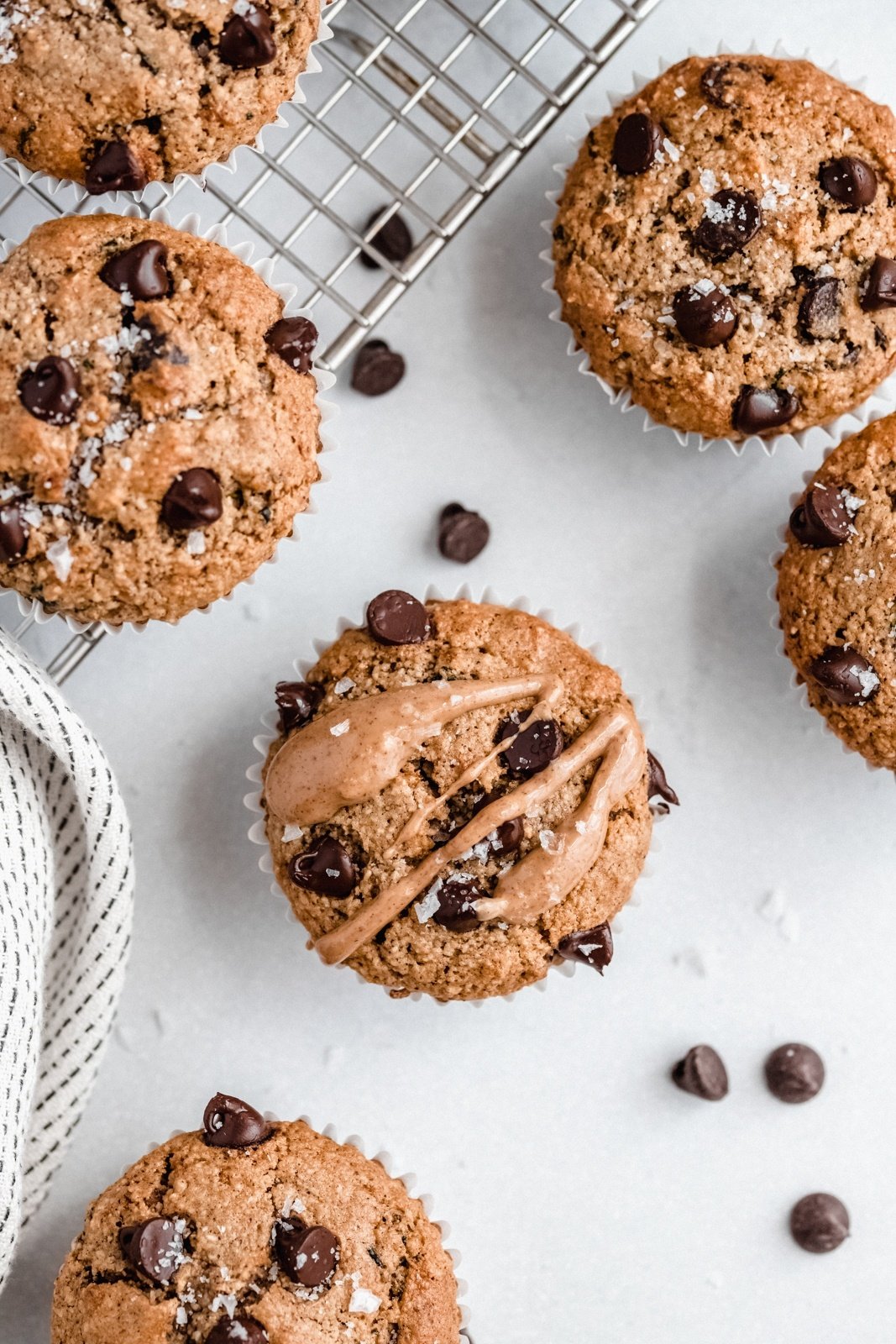 healthy zucchini muffin drizzled with peanut butter