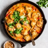 ginger chicken meatballs in a cast iron skillet