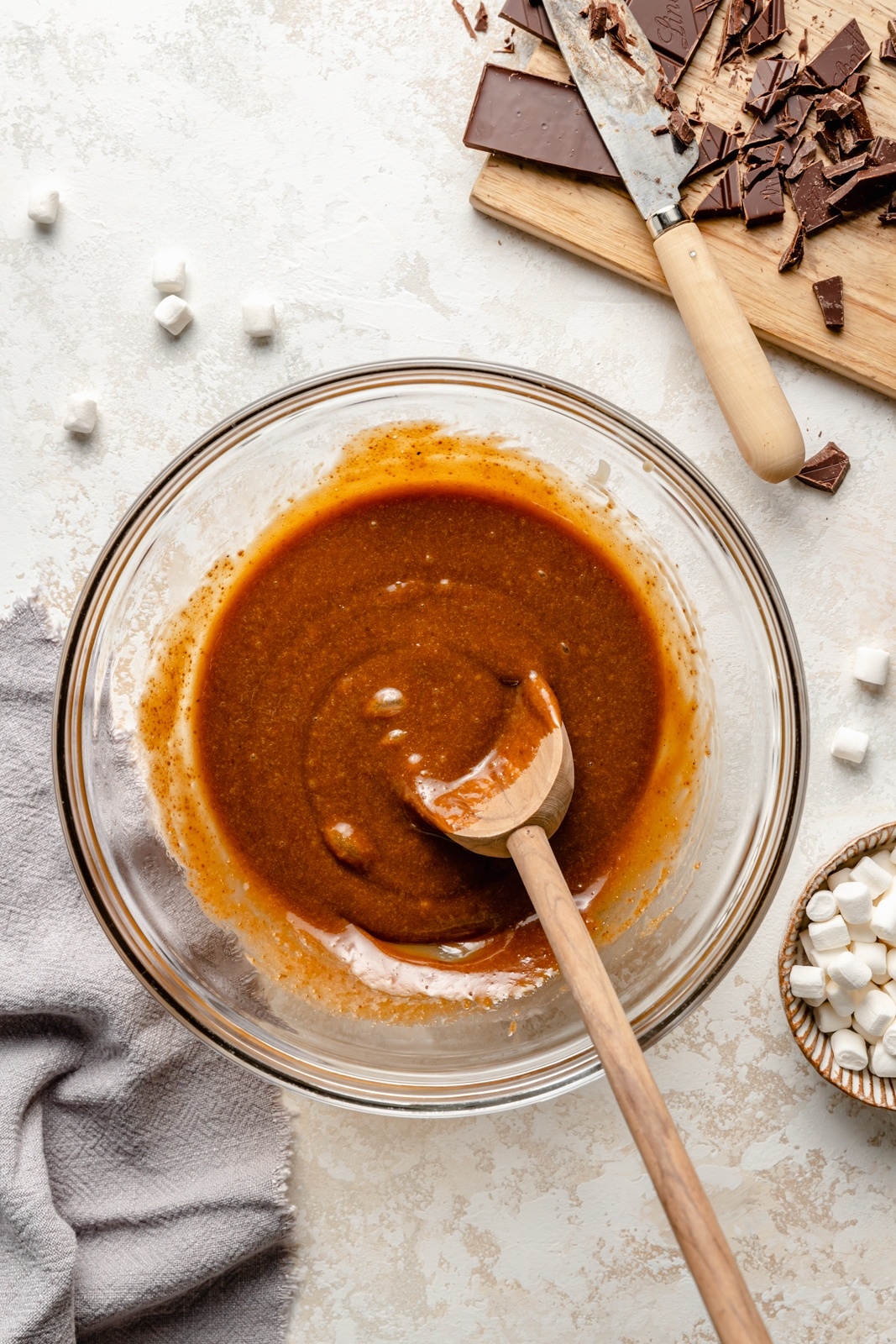 mixing wet ingredients for tahini s'mores cookie bars