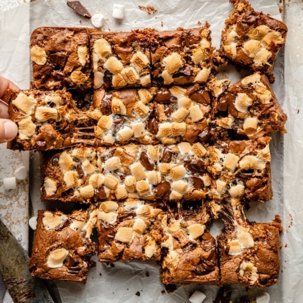 tahini s'mores bars sliced on parchment paper