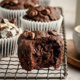 grain free chocolate banana muffin with a bite taken out