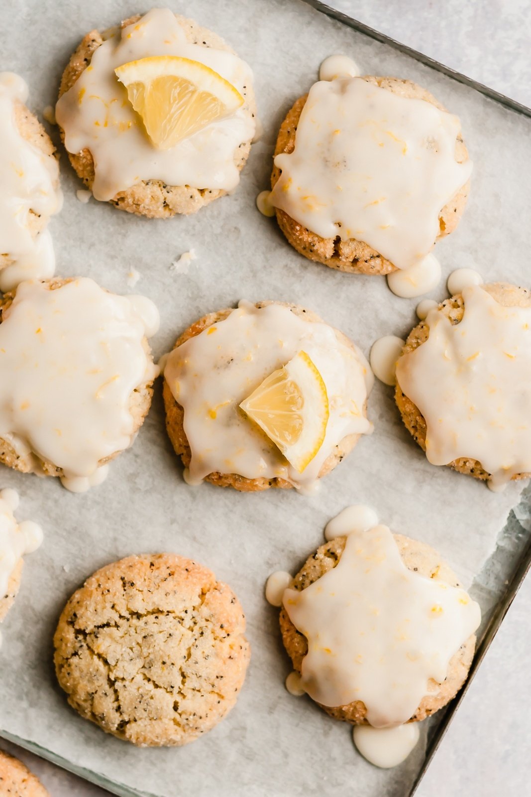 healthy lemon cookies with glaze on a baking sheet