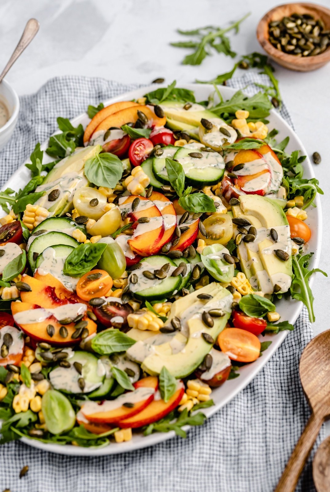 peach tomato salad on a platter