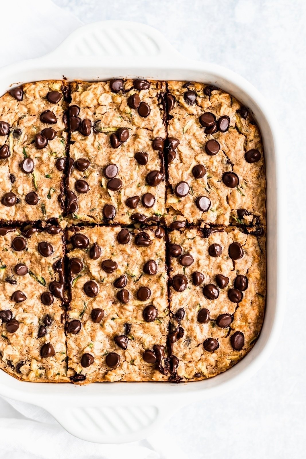 zucchini bread baked oatmeal in a square baking dish