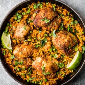 Puerto Rican Chicken and Rice in a skillet