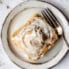 pumpkin cinnamon roll on a plate