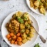 sheet pan honey mustard chicken and vegetables on a plate