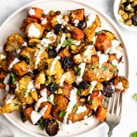 sheet pan moroccan chicken and sweet potatoes on a plate