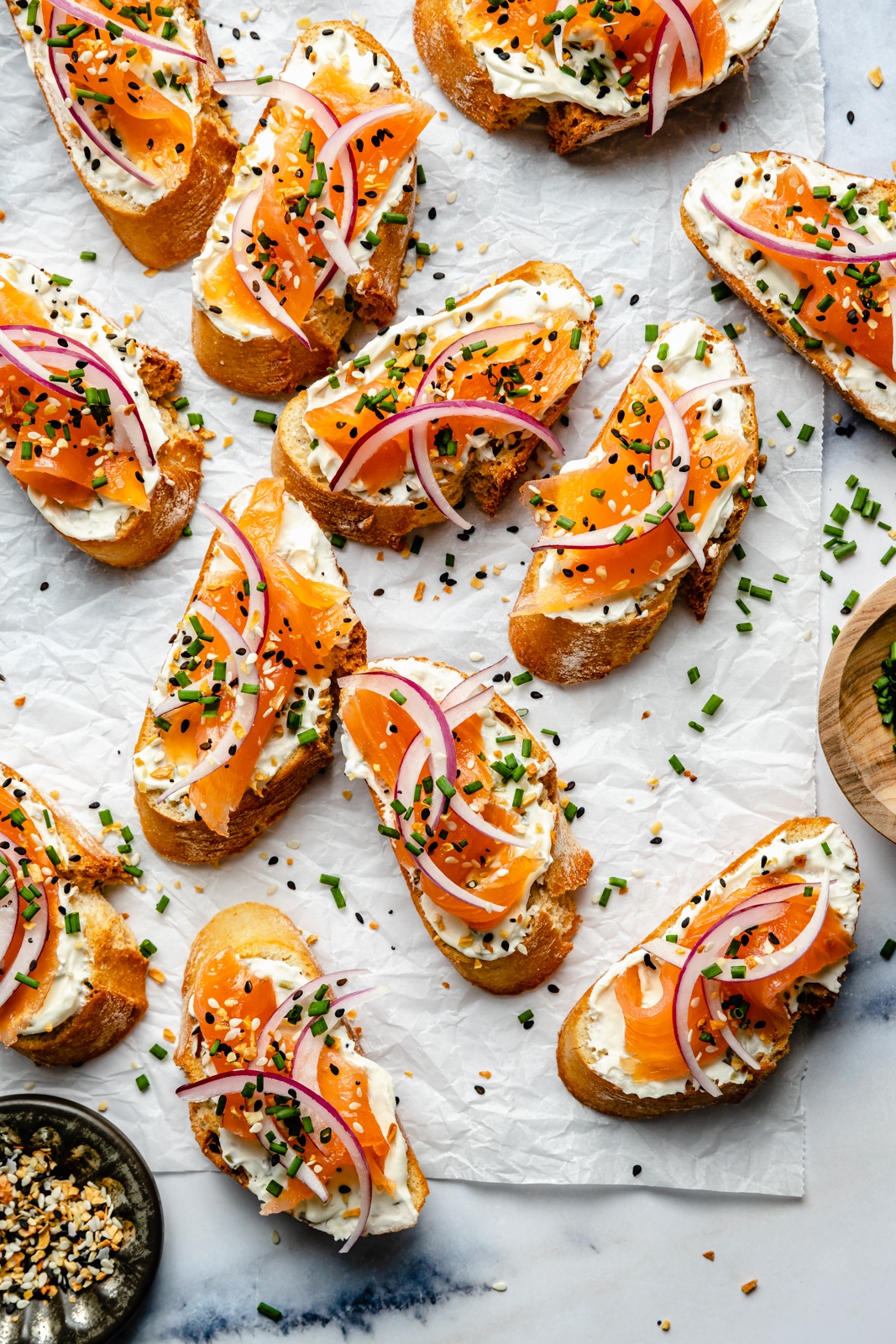 smoked salmon crostini on parchment paper