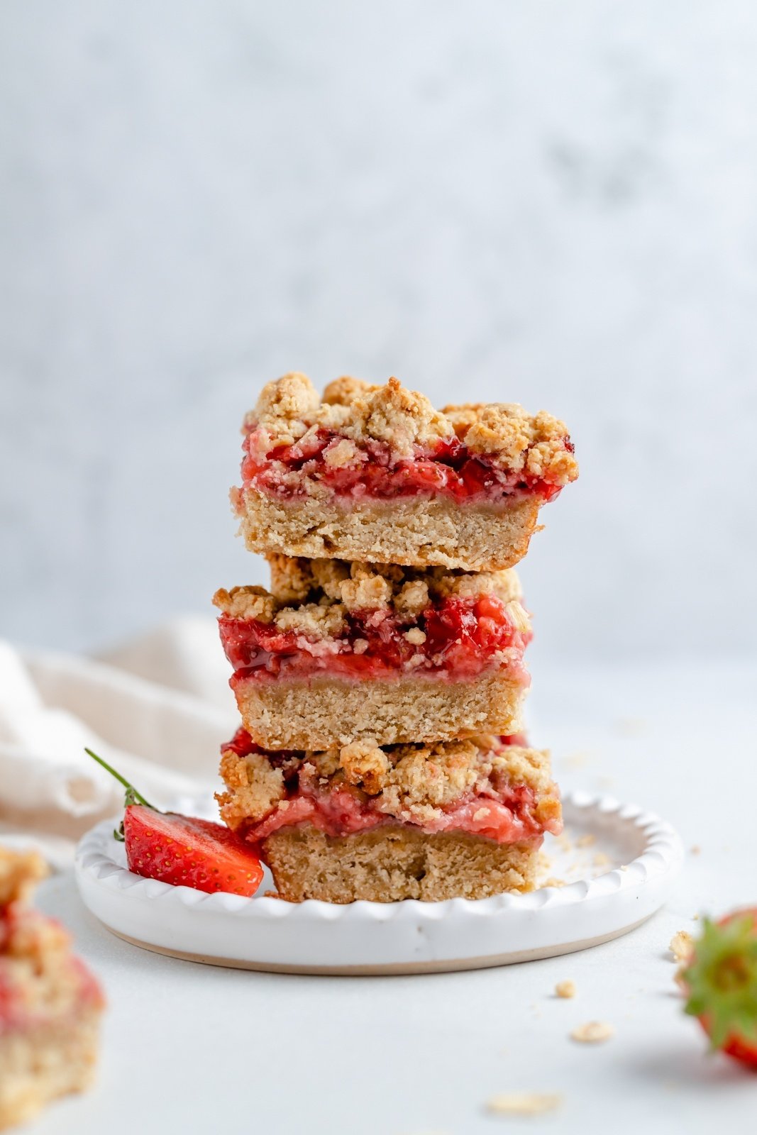 strawberry oatmeal crumble bars in a stack