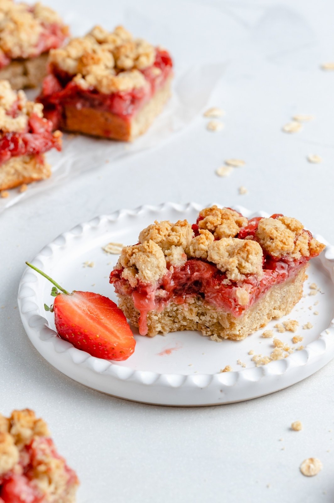 gluten free strawberry crumble bar on a plate