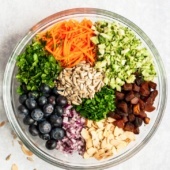 healthy broccoli salad ingredients in a bowl