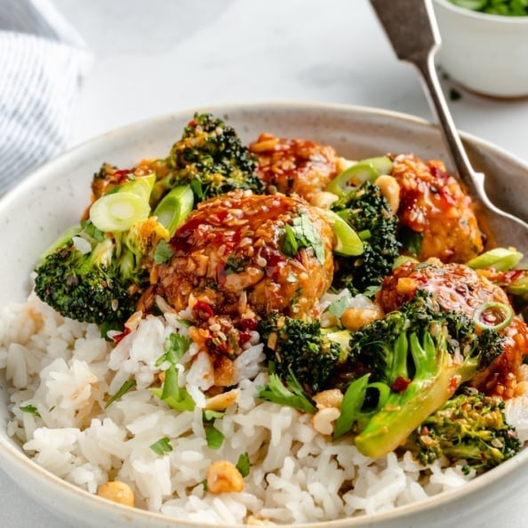 sesame chicken meatball bowls with broccoli and rice