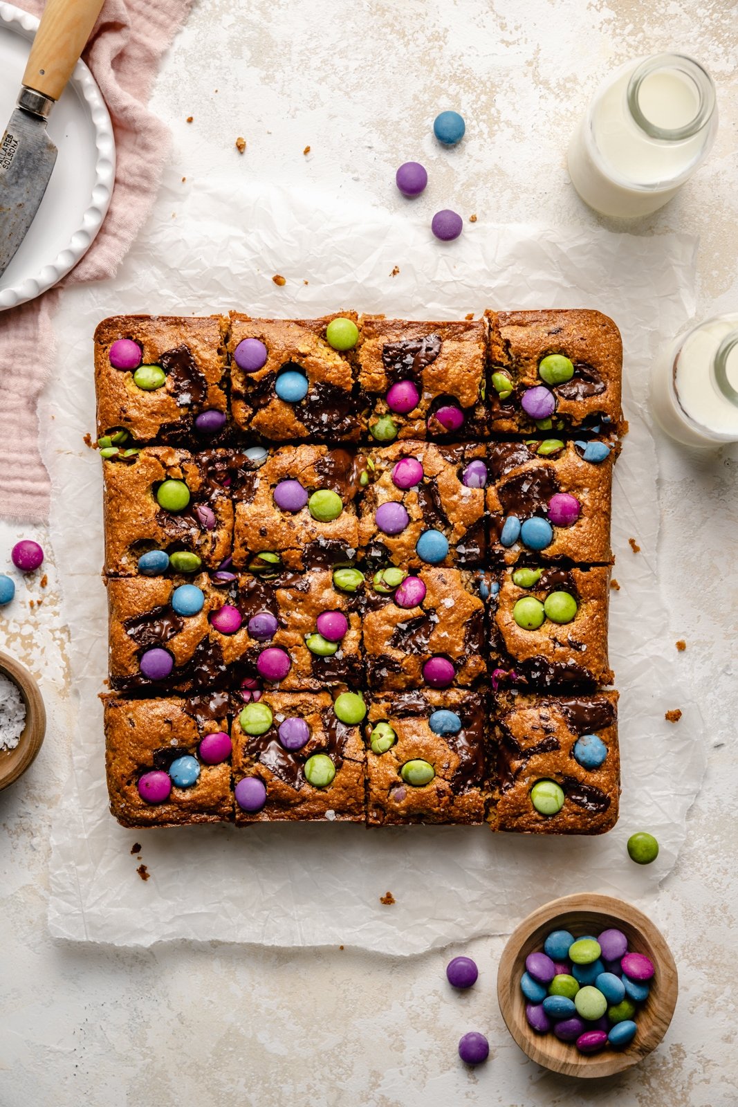 monster cookie bars sliced on parchment paper