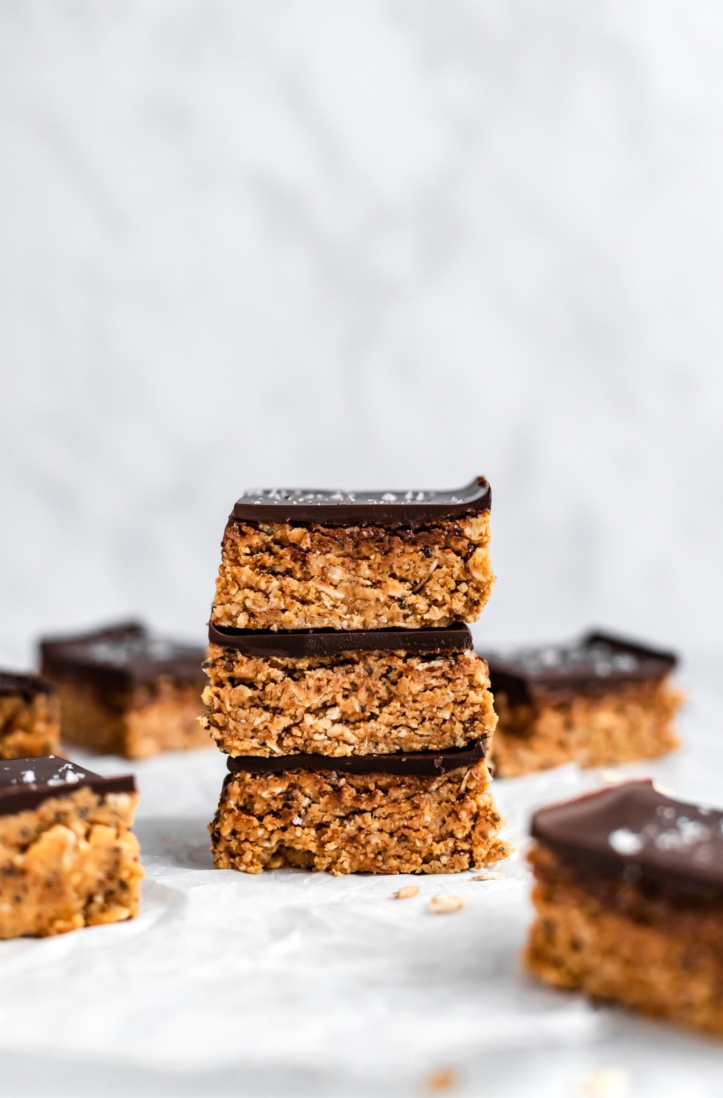 no bake chocolate peanut butter oatmeal bars in a stack