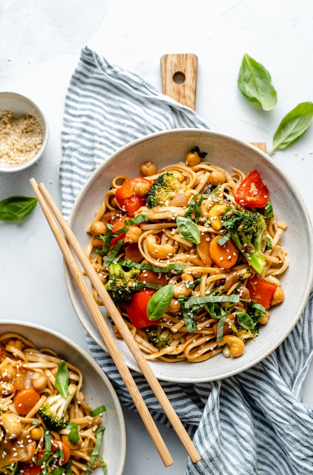 easy vegan stir fry noodles in a bowl with chopsticks